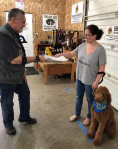 Healing Haven ABA Therapy Golden Doodle Huxley with her humans