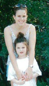 Image of woman standing with child