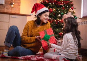 giving Christmas gift to child