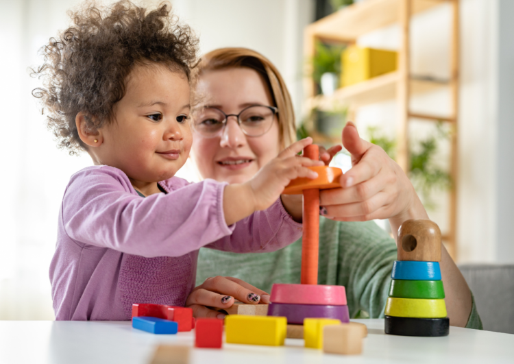 BCBA playing with child.